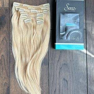 Brand new beautiful Donna Bella clip in extensions 16 inches light blonde